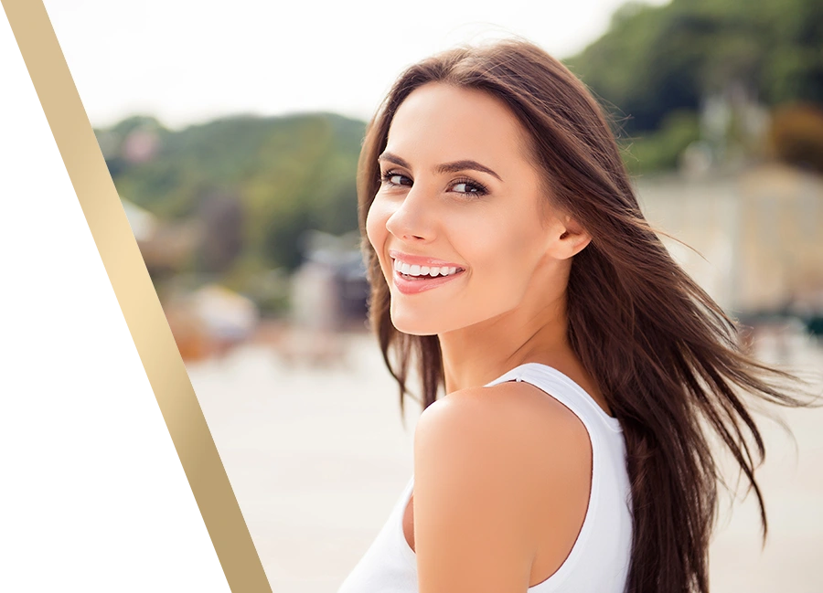 woman with amazing brows outside enjoying herself