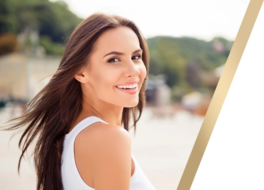 beautiful women smiling looking over her shoulder